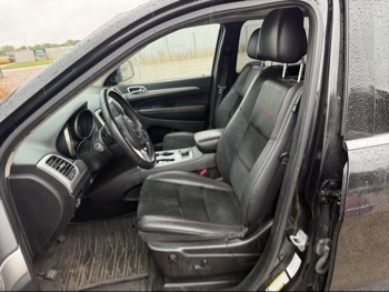 2013 jeep grand-cherokee laredo-4wd with 134157 miles for sale near elk-river, minnesota 106371_22_driver_seat.jpg
