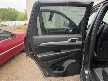 2013 jeep grand-cherokee laredo-4wd with 134157 miles for sale near elk-river, minnesota 106371_25_drv_rear_door_panel.jpg