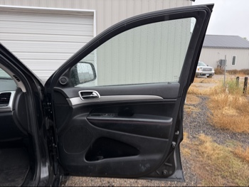 2013 jeep grand-cherokee laredo-4wd with 134157 miles for sale near elk-river, minnesota 106371_32_passenger_door_panel.jpg