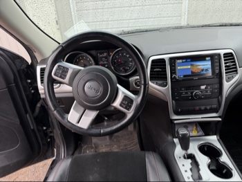 2013 jeep grand-cherokee laredo-4wd with 134157 miles for sale near elk-river, minnesota 106371_33_dash_from_driver.jpg