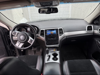 2013 jeep grand-cherokee laredo-4wd with 134157 miles for sale near elk-river, minnesota 106371_34_whole_dash.jpg