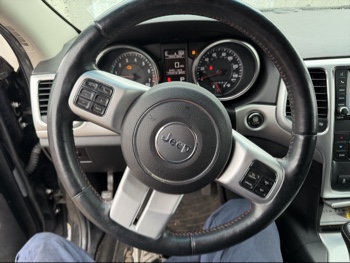 2013 jeep grand-cherokee laredo-4wd with 134157 miles for sale near elk-river, minnesota 106371_36_steering_wheel.jpg