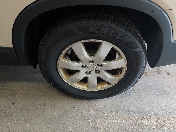 2011 kia sorento lx-4wd with 201883 miles for sale near elk-river, minnesota 106372_13_rear_drv_wheel.jpg