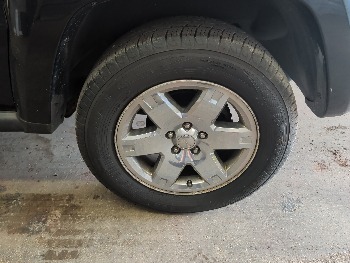 2007 jeep liberty limited-4wd with 169092 miles for sale near elk-river, minnesota 106389_13_rear_drv_wheel.jpg