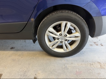 2010 hyundai tucson limited-2wd with 229317 miles for sale near elk-river, minnesota 106392_13_rear_drv_wheel.jpg