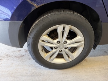 2010 hyundai tucson limited-2wd with 229317 miles for sale near elk-river, minnesota 106392_14_rear_pass_wheel.jpg
