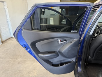 2010 hyundai tucson limited-2wd with 229317 miles for sale near elk-river, minnesota 106392_25_drv_rear_door_panel.jpg