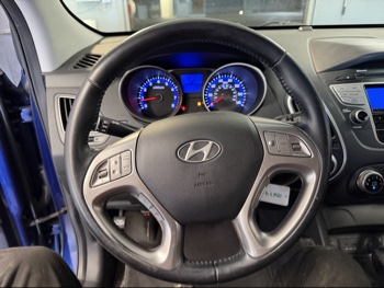 2010 hyundai tucson limited-2wd with 229317 miles for sale near elk-river, minnesota 106392_36_steering_wheel.jpg