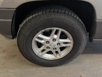 2003 jeep grand-cherokee laredo-4wd with 126243 miles for sale near elk-river, minnesota 106393_12_drv_front_wheel.jpg