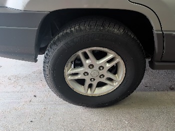 2003 jeep grand-cherokee laredo-4wd with 126243 miles for sale near elk-river, minnesota 106393_14_rear_pass_wheel.jpg