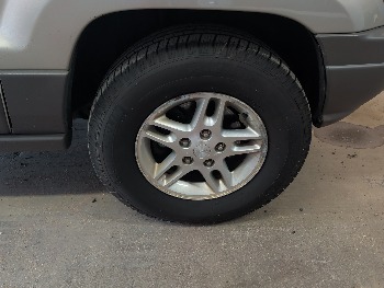 2003 jeep grand-cherokee laredo-4wd with 126243 miles for sale near elk-river, minnesota 106393_15_front_pass_wheel.jpg