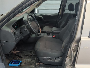2003 jeep grand-cherokee laredo-4wd with 126243 miles for sale near elk-river, minnesota 106393_22_driver_seat.jpg