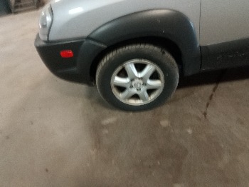 2005 hyundai tucson gls-2.7-4wd with 199158 miles for sale near elk-river, minnesota 106395_12_drv_front_wheel.jpg