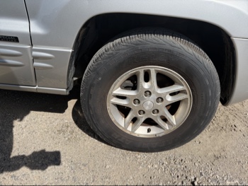2004 jeep grand-cherokee laredo-2wd with 138807 miles for sale near elk-river, minnesota 106397_15_front_pass_wheel.jpg