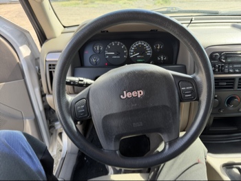 2004 jeep grand-cherokee laredo-2wd with 138807 miles for sale near elk-river, minnesota 106397_36_steering_wheel.jpg