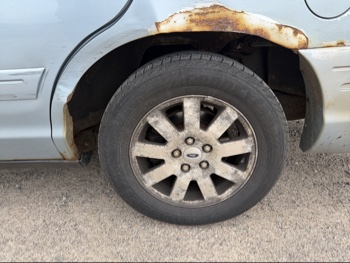 2007 ford crown-victoria lx with 175864 miles for sale near elk-river, minnesota 106403_13_rear_drv_wheel.jpg