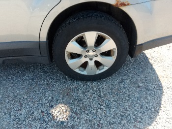 2010 subaru outback with 187512 miles for sale near elk-river, minnesota 106407_13_rear_drv_wheel.jpg