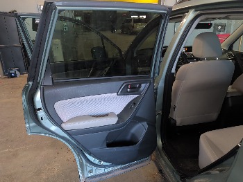 2017 subaru forester 2.5i-premium-pzev-cvt with 119029 miles for sale near elk-river, minnesota 106413_25_drv_rear_door_panel.jpg