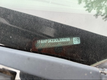 2012 ford focus se with 200341 miles for sale near elk-river, minnesota 106416_48_windshield_vin_plate.jpg