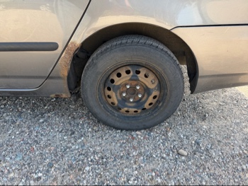 2007 toyota corolla ce with 165644 miles for sale near elk-river, minnesota 106417_13_rear_drv_wheel.jpg