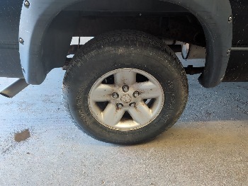 2002 dodge ram-1500 st-quad-cab-short-bed-4wd with 216281 miles for sale near elk-river, minnesota 106418_14_rear_pass_wheel.jpg