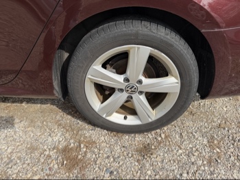 2012 volkswagen passat with 133891 miles for sale near elk-river, minnesota 106420_13_rear_drv_wheel.jpg
