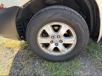 2002 toyota highlander with 215929 miles for sale near elk-river, minnesota 106423_12_drv_front_wheel.jpg