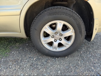 2002 toyota highlander with 215929 miles for sale near elk-river, minnesota 106423_13_rear_drv_wheel.jpg