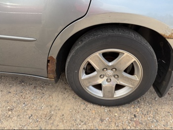 2006 dodge charger base with 164904 miles for sale near elk-river, minnesota 106434_13_rear_drv_wheel.jpg