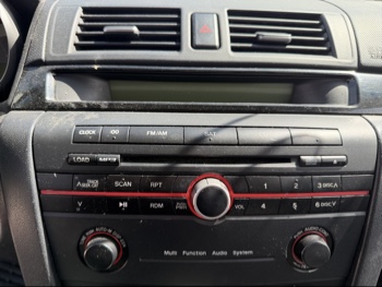 2008 mazda mazda3 i-sport-4-door with 106057 miles for sale near elk-river, minnesota 106437_39_radio_closeup.jpg