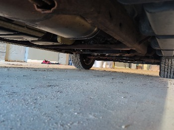2007 chevrolet suburban ls-1500-4wd with 182367 miles for sale near elk-river, minnesota 106439_20_undercar_rear_pass.jpg