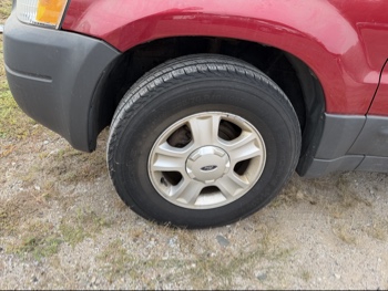 2004 ford escape xlt-2wd with 178342 miles for sale near elk-river, minnesota 106441_12_drv_front_wheel.jpg