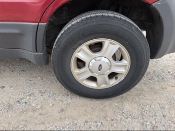 2004 ford escape xlt-2wd with 178342 miles for sale near elk-river, minnesota 106441_13_rear_drv_wheel.jpg