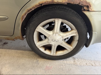 2003 infiniti i35 luxury with 176048 miles for sale near elk-river, minnesota 106442_13_rear_drv_wheel.jpg