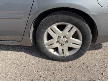 2006 chevrolet impala with 107595 miles for sale near elk-river, minnesota 106444_13_rear_drv_wheel.jpg