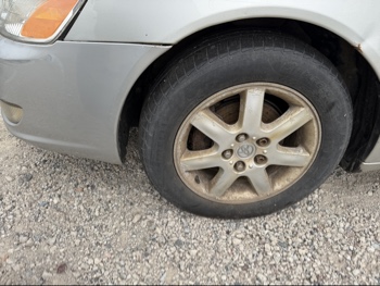 2000 toyota avalon xl with 226788 miles for sale near elk-river, minnesota 106459_12_drv_front_wheel.jpg