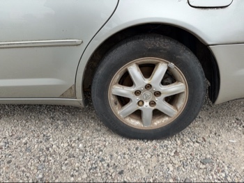 2000 toyota avalon xl with 226788 miles for sale near elk-river, minnesota 106459_13_rear_drv_wheel.jpg