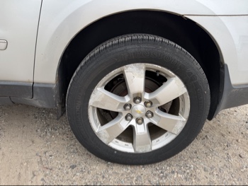 2014 chevrolet traverse ltz-awd with 293494 miles for sale near elk-river, minnesota 106460_13_rear_drv_wheel.jpg