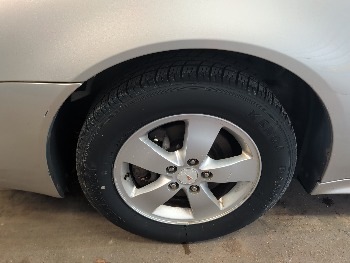 2007 pontiac grand-prix sedan with 184147 miles for sale near elk-river, minnesota 106461_12_drv_front_wheel.jpg