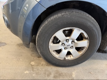 2011 ford escape limited-4wd with 142385 miles for sale near elk-river, minnesota 106472_12_drv_front_wheel.jpg