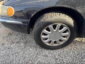 2002 lincoln continental base for sale near Elk River, Minnesota 106475_12_drv_front_wheel.jpg