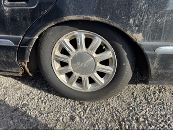2002 lincoln continental base for sale near Elk River, Minnesota 106475_13_rear_drv_wheel.jpg