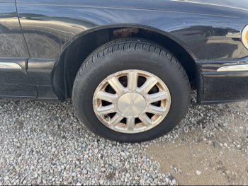 2002 lincoln continental base for sale near Elk River, Minnesota 106475_15_front_pass_wheel.jpg