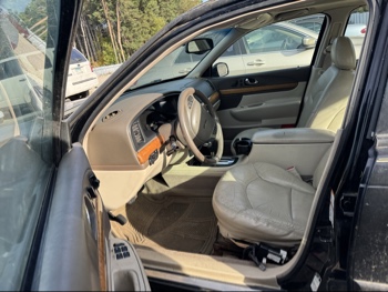 2002 lincoln continental base for sale near Elk River, Minnesota 106475_22_driver_seat.jpg