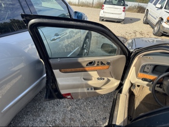 2002 lincoln continental base for sale near Elk River, Minnesota 106475_23_driver_door_panel.jpg