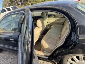 2002 lincoln continental base for sale near Elk River, Minnesota 106475_24_drv_rear_seat.jpg