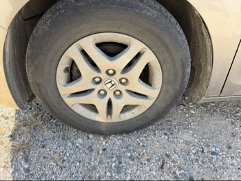 2006 honda odyssey ex-l with 261539 miles for sale near elk-river, minnesota 106484_12_drv_front_wheel.jpg