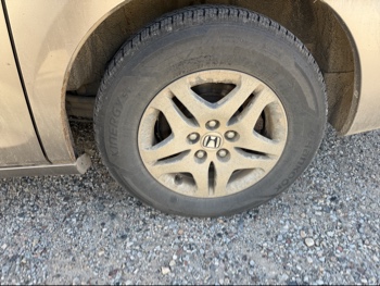 2006 honda odyssey ex-l with 261539 miles for sale near elk-river, minnesota 106484_13_rear_drv_wheel.jpg