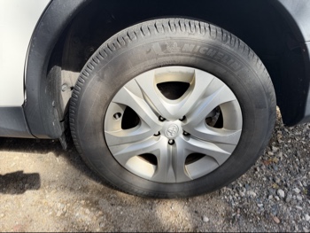 2014 toyota rav4 le-awd with 241220 miles for sale near elk-river, minnesota 106485_13_rear_drv_wheel.jpg