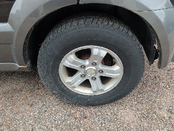 2006 kia sorento ex-4wd with 262272 miles for sale near elk-river, minnesota 106486_13_rear_drv_wheel.jpg